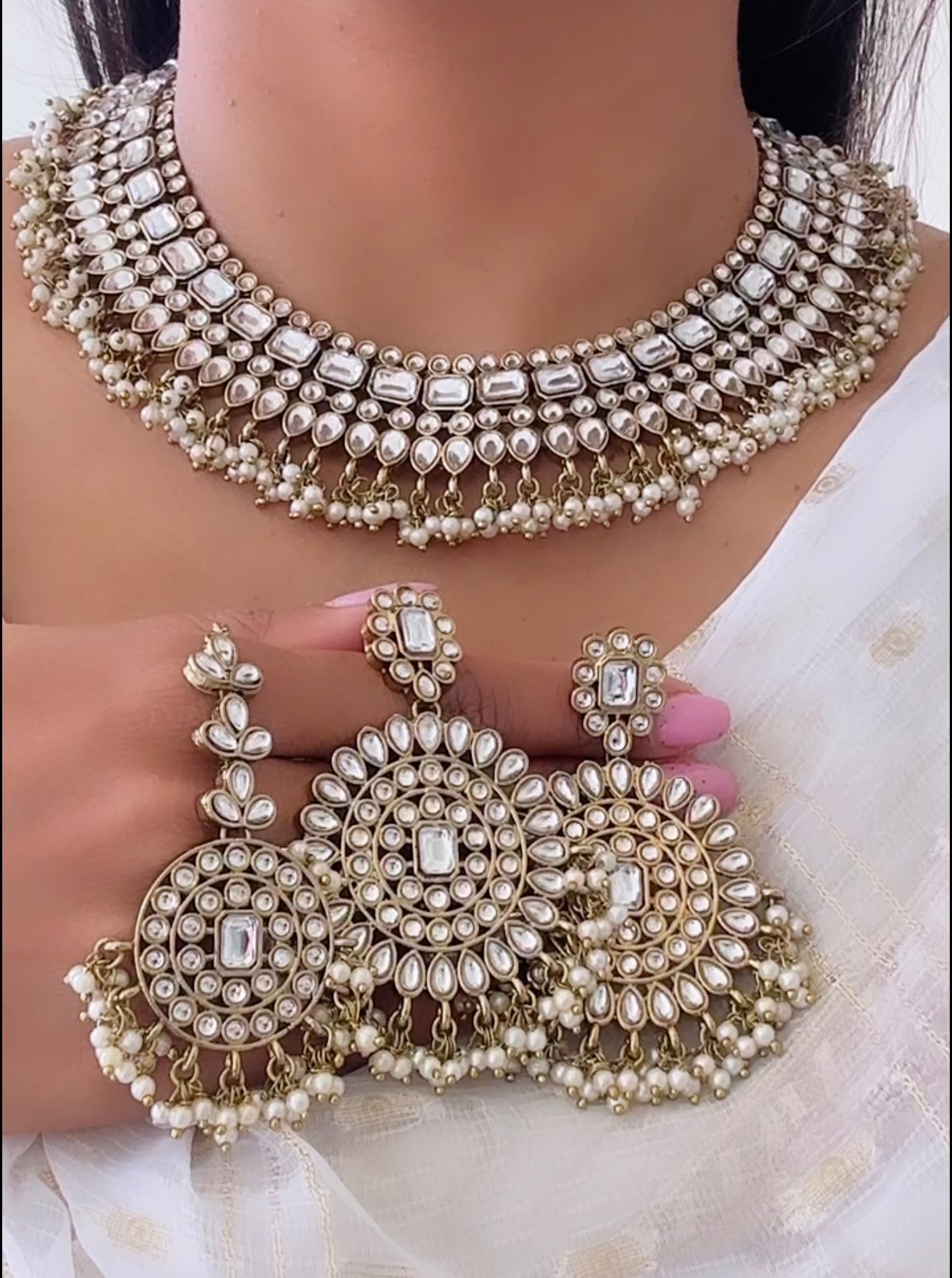 Kundan necklace set in golden white