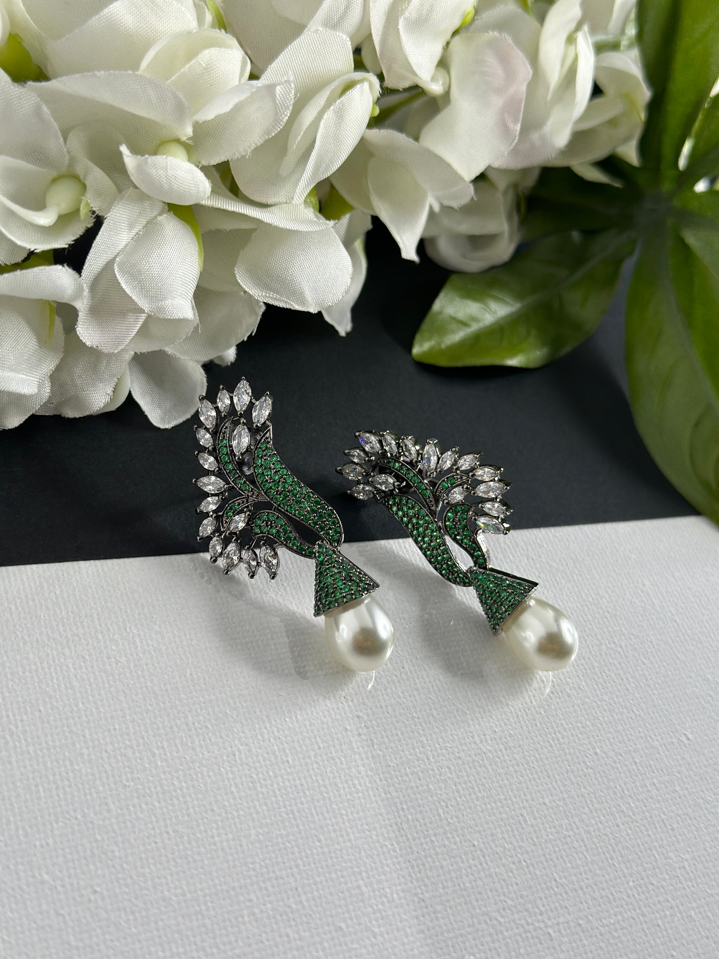 Green Earrings in American diamonds