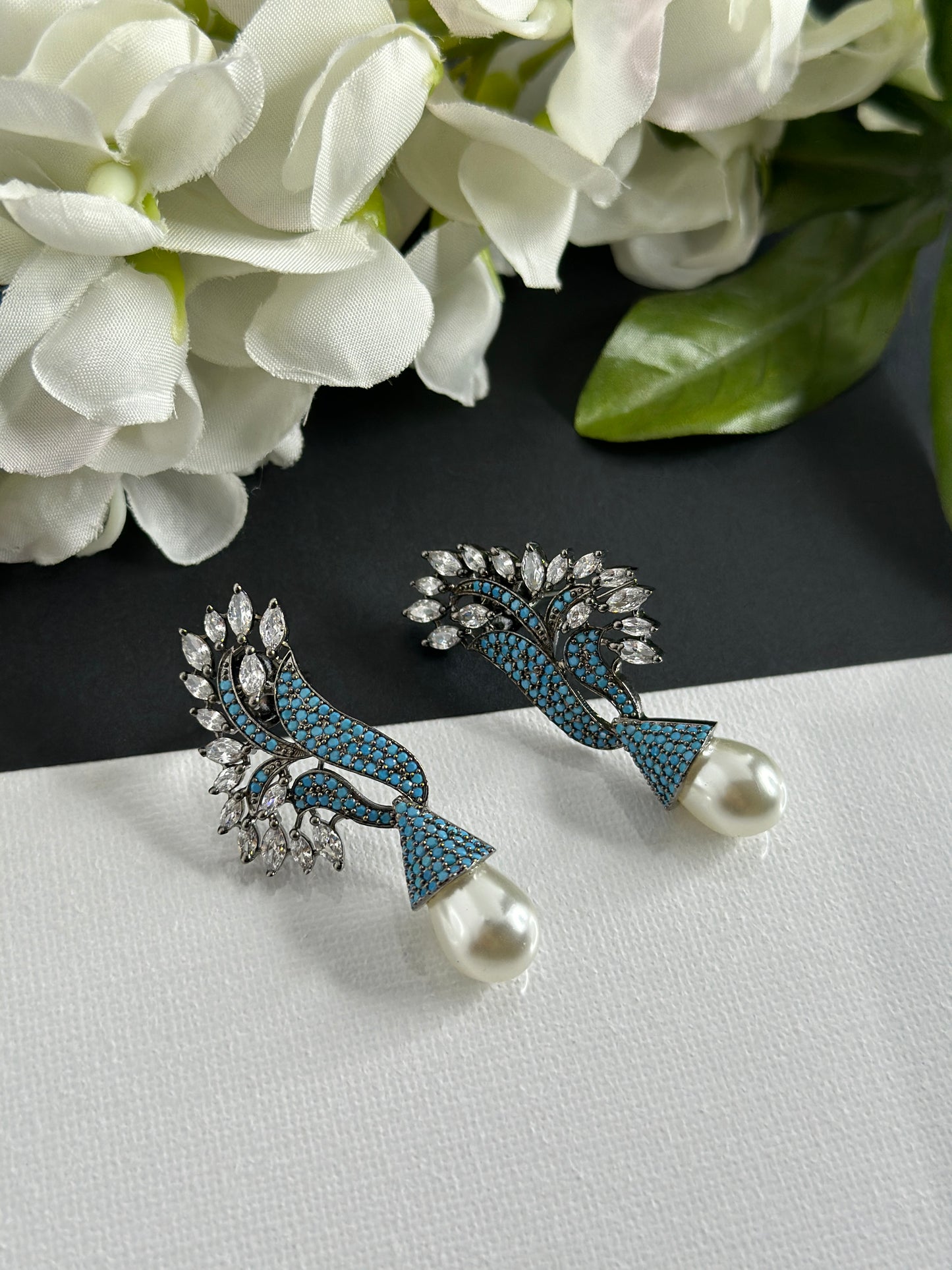 Blue earrings in American diamonds