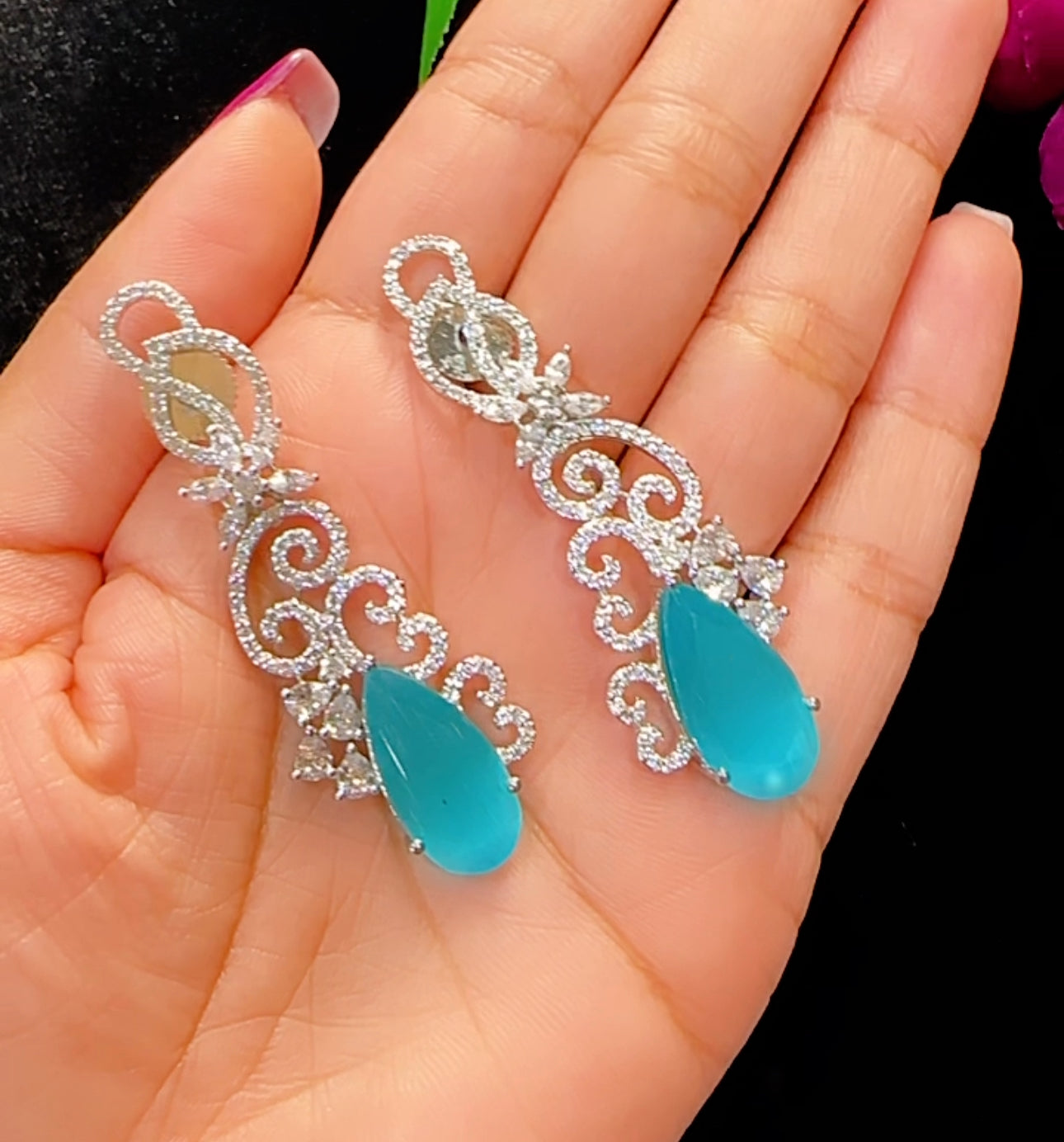 Earrings in American diamonds