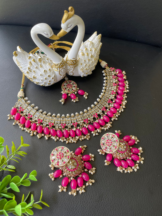 Polki set in magenta colour