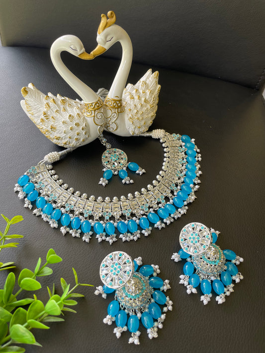 Polki set in firoji colour