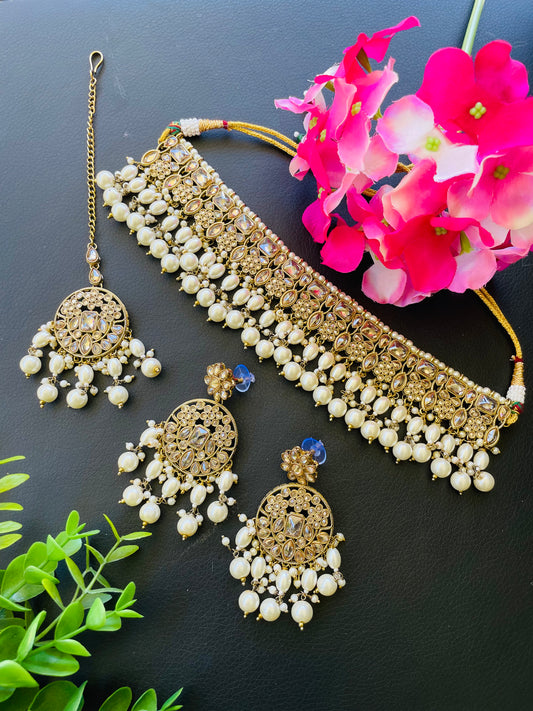 Choker set in white & golden colour