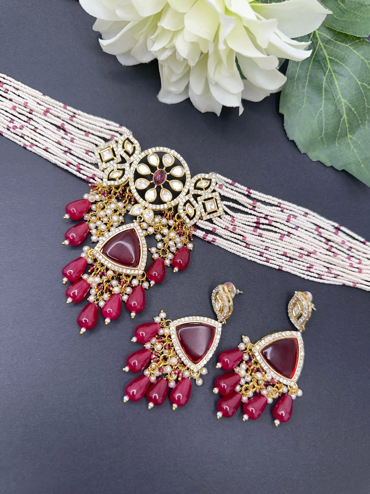 Uncut kundan choker set in mehroon colour