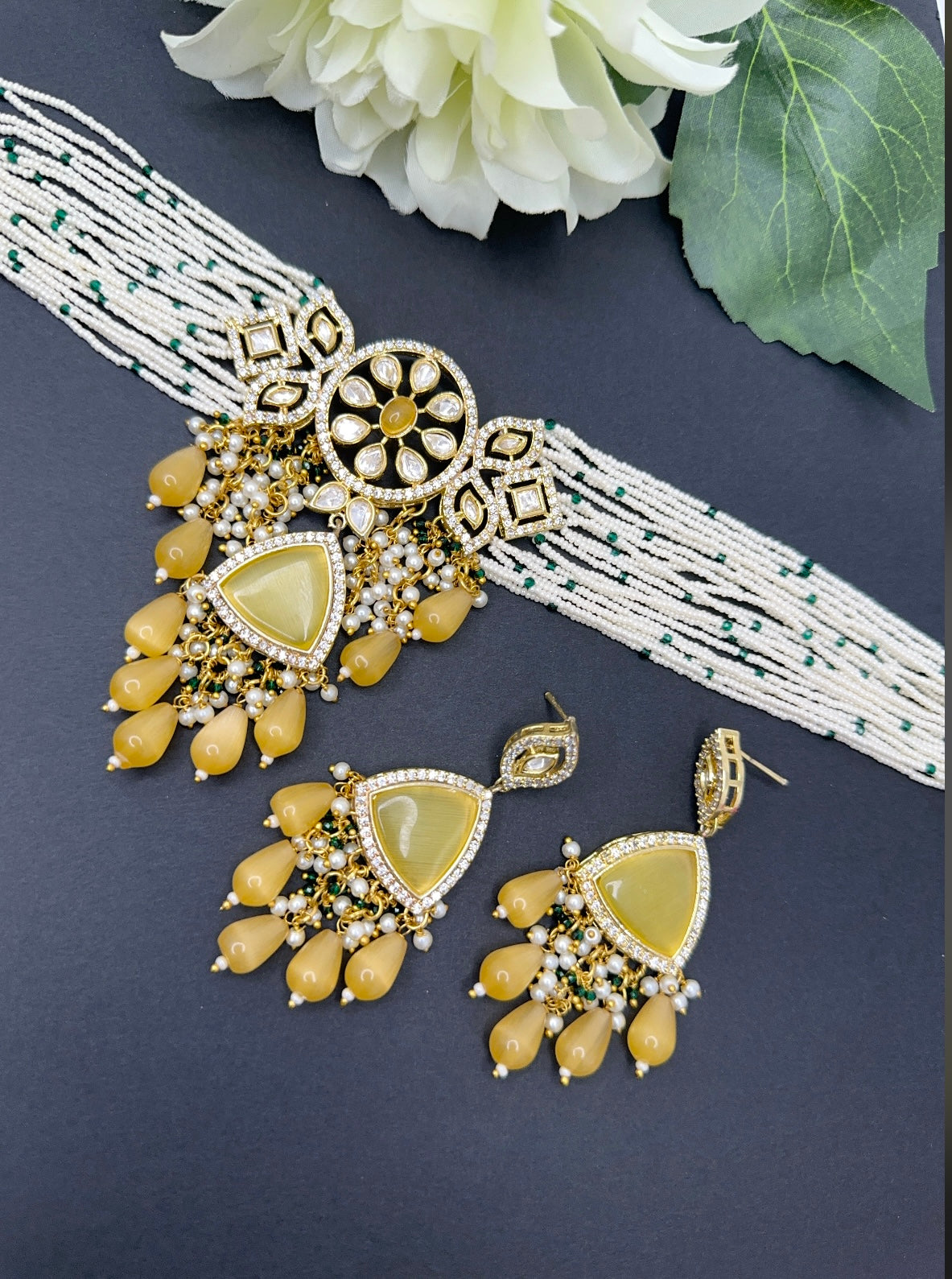 Uncut kundan choker set in yellow colour